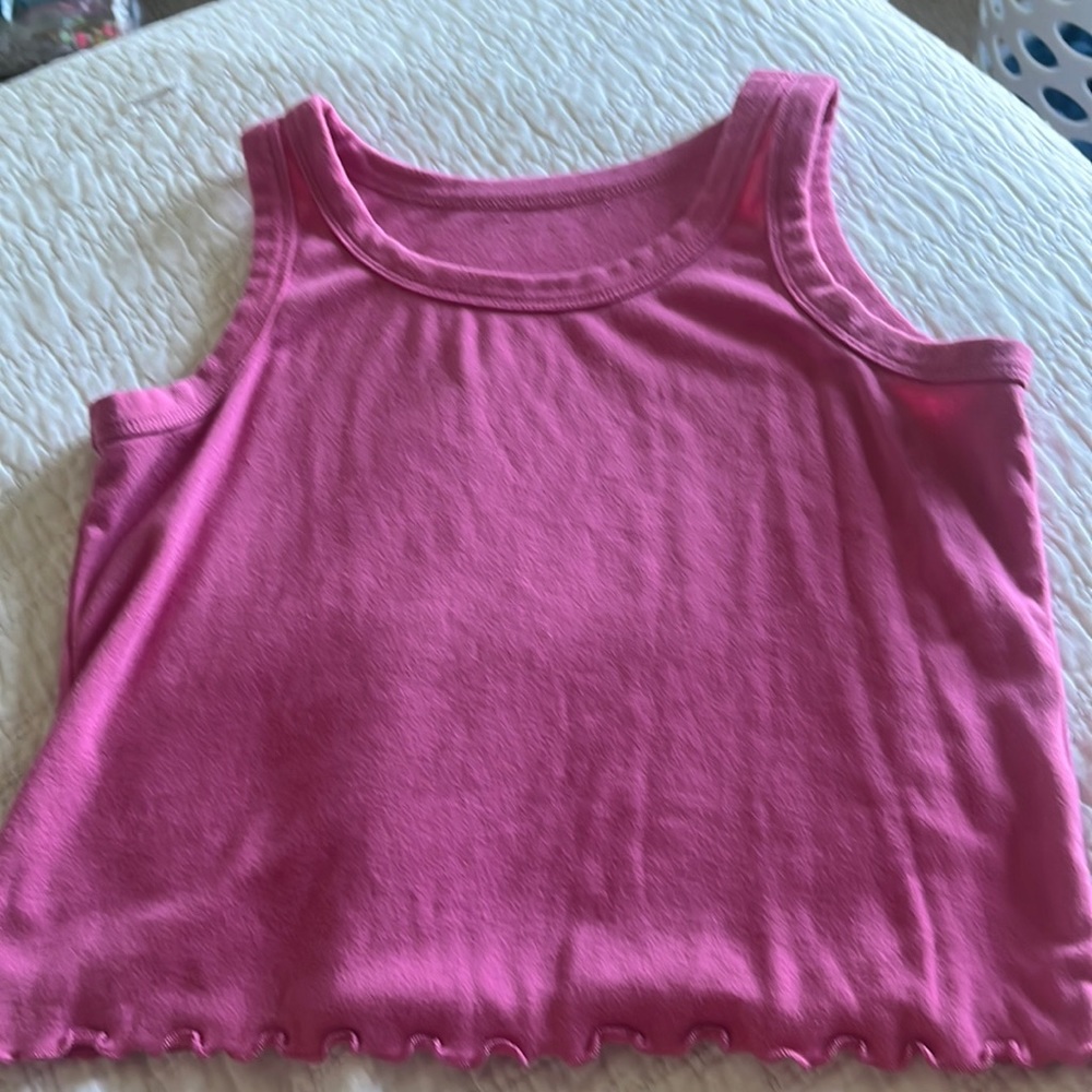 Medium length, lettuce trim hot pink tank top